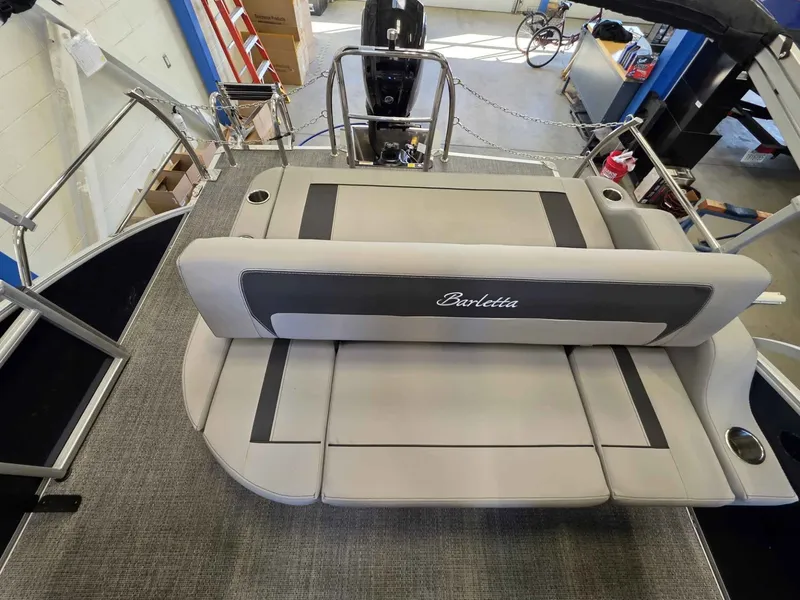 Slide: The Image of 2026 Barletta ARIA 20UC pontoon boat with gray interior seating. - 17