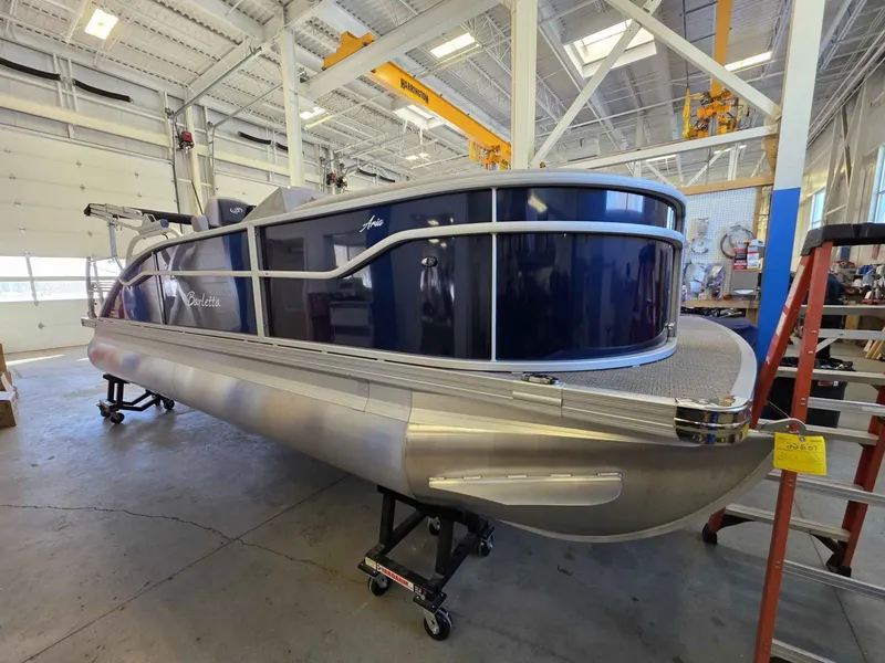 Slide: The Image of Barletta ARIA 20UC 2026 pontoon boat in workshop. - 2