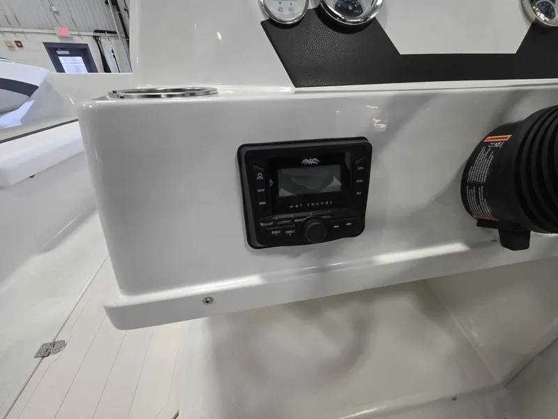 Slide: The Image of Dashboard of 2026 Starcraft SVX 171 OB with Wet Sounds system. - 14