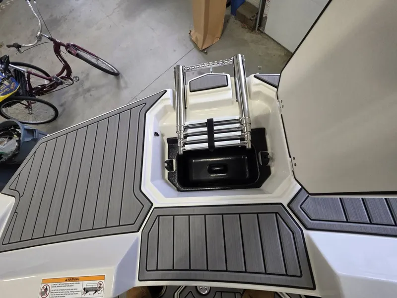 Slide: The Image of Starcraft SVX 171 OB 2026 boat with retractable ladder. - 16