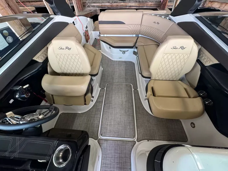 Slide: The Image of Interior of Sea Ray SLX 260 boat, luxurious seating, 2026 model. - 14