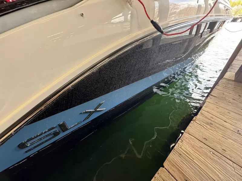 Slide: The Image of Sea Ray SLX 260 boat at dock, year 2026. - 4