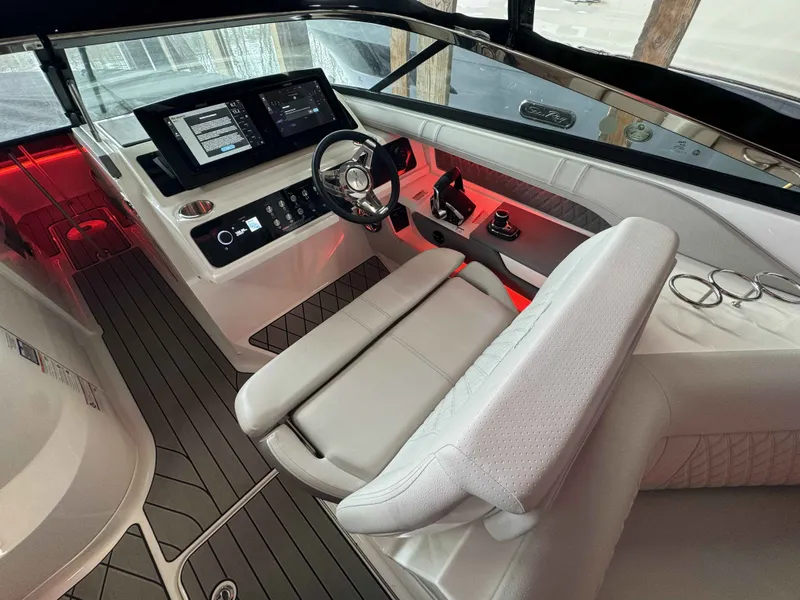 Slide: The Image of Interior of 2026 Sea Ray SLX 310 yacht cockpit. - 13