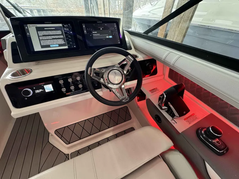 Slide: The Image of Interior of 2026 Sea Ray SLX 310 with modern cockpit design. - 14