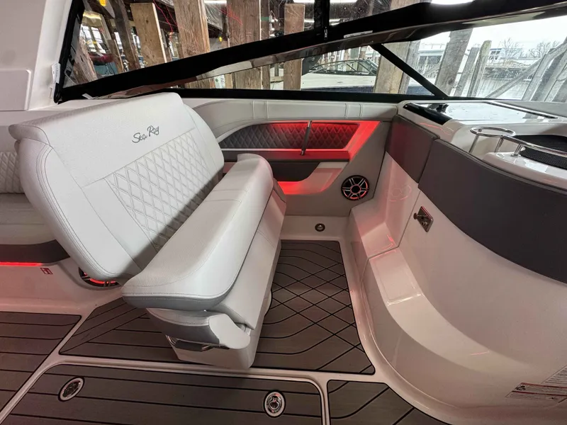 Slide: The Image of Interior of 2026 Sea Ray SLX 310 boat with luxurious seating. - 16