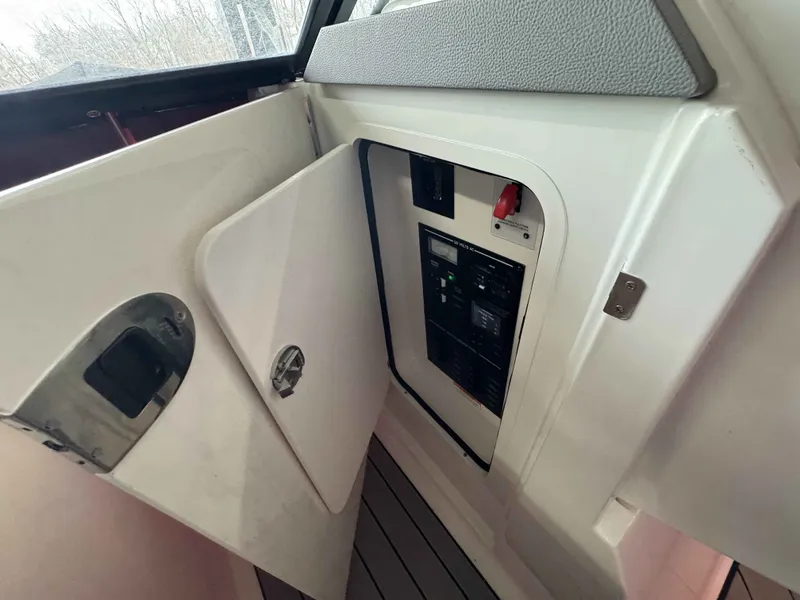 Slide: The Image of Electrical panel of 2026 Sea Ray SLX 310 boat. - 19
