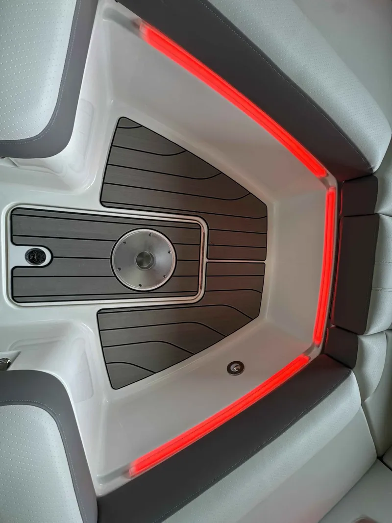 Slide: The Image of Interior of 2026 Sea Ray SLX 310 with red LED lighting. - 22