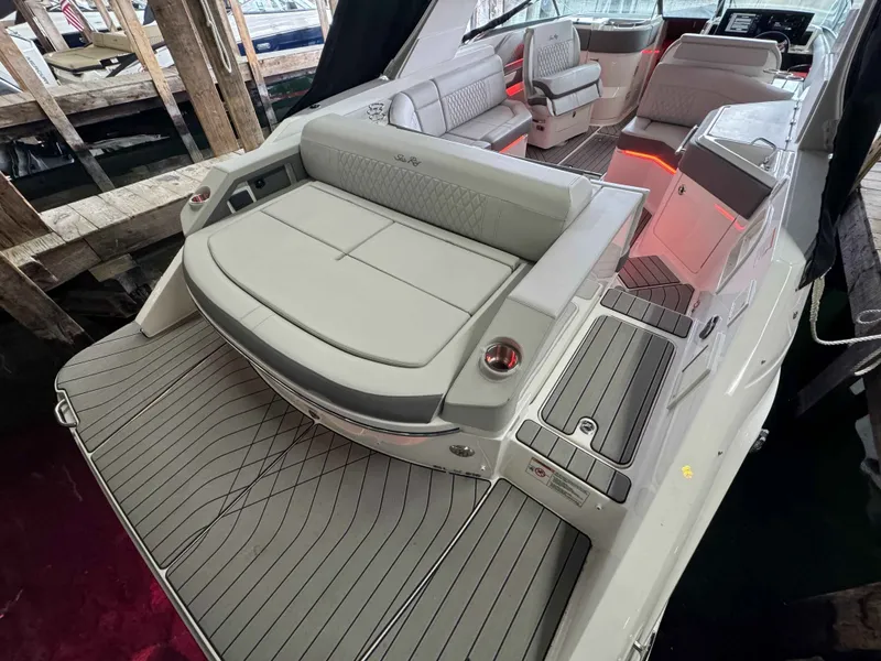 Slide: The Image of Luxurious Sea Ray SLX 310 boat, 2026 model, featuring elegant interior design. - 4