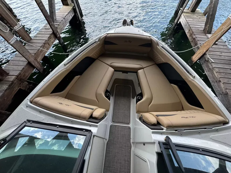 Slide: The Image of Interior view of 2026 Sea Ray 280SLX boat with beige seating. - 10