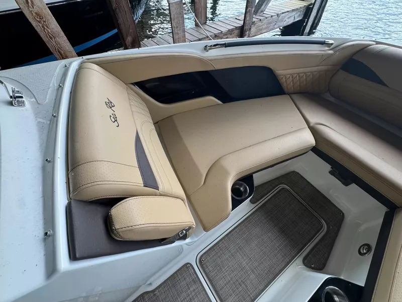 Slide: The Image of Interior of 2026 Sea Ray 280SLX with beige leather seating. - 11