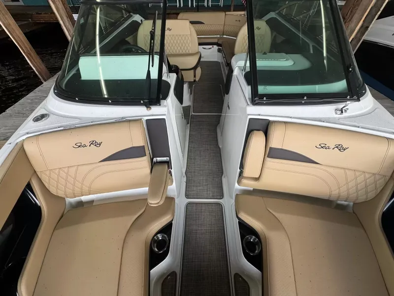 Slide: The Image of Interior of 2026 Sea Ray 280SLX boat with beige leather seating. - 13