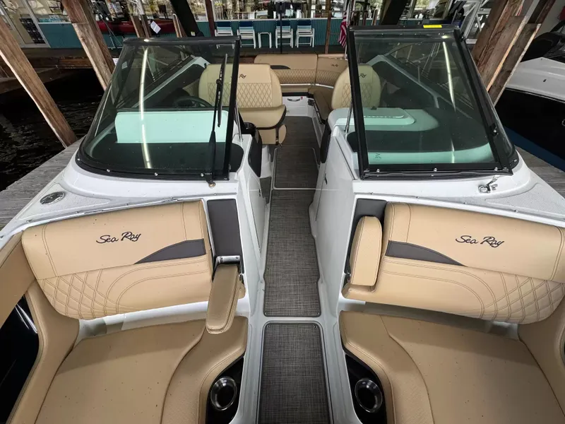 Slide: The Image of Interior of 2026 Sea Ray 280SLX with beige leather seats. - 14