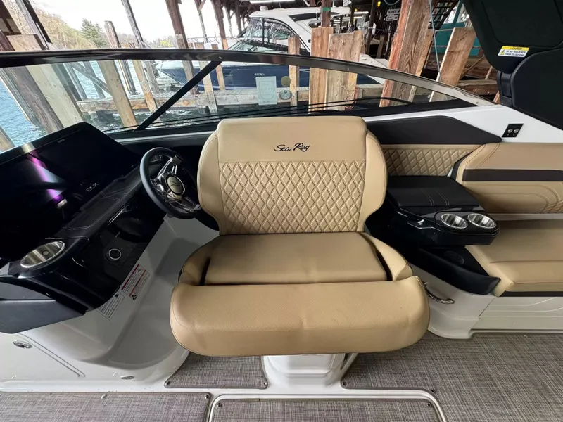 Slide: The Image of Interior of 2026 Sea Ray 280SLX with luxurious leather seating. - 16