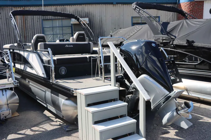 Slide: The Image of 2026 Barletta Corsa 23UC pontoon boat with outboard motor. - 14