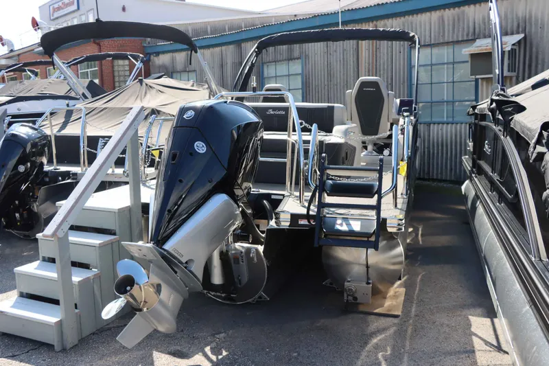 Slide: The Image of 2026 Barletta Corsa 23UC pontoon boat with outboard motor. - 16