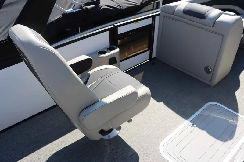 Slide: The Image of Interior of 2026 Barletta Corsa 23UC with gray seating. - 24