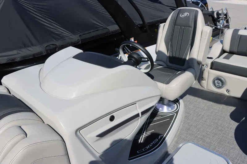 Slide: The Image of Interior of 2026 Barletta Corsa 23UC with steering wheel and seat. - 32