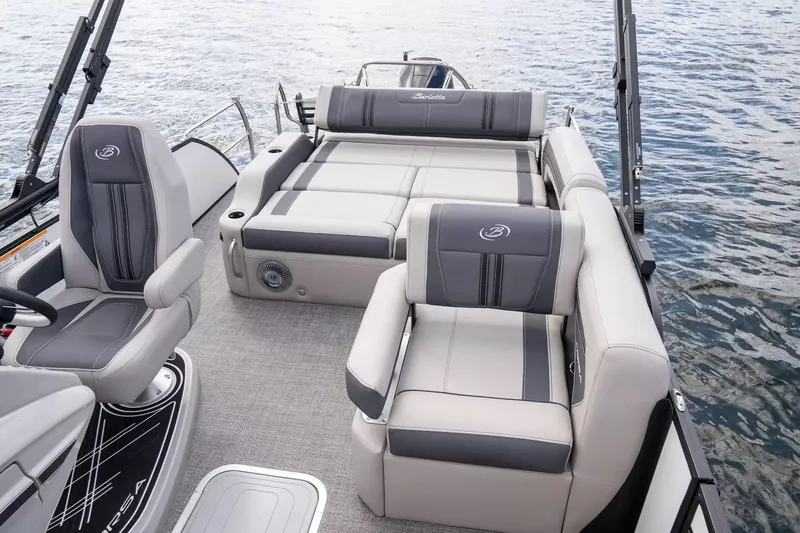 Slide: The Image of 2026 Barletta Corsa 23UC pontoon boat with luxurious seating on water. - 5