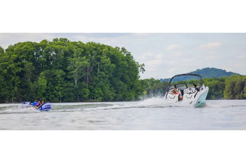 Slide: The Image of Yamaha 222S boat 2026 towing water sports enthusiasts on a lake. - 10