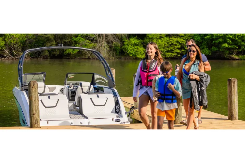 Slide: The Image of Family leaving Yamaha 222S boat at lakeside dock. - 11