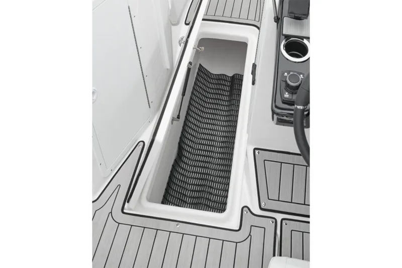 Slide: The Image of Yamaha Boats 222S 2026, storage compartment with anti-slip mat. - 6