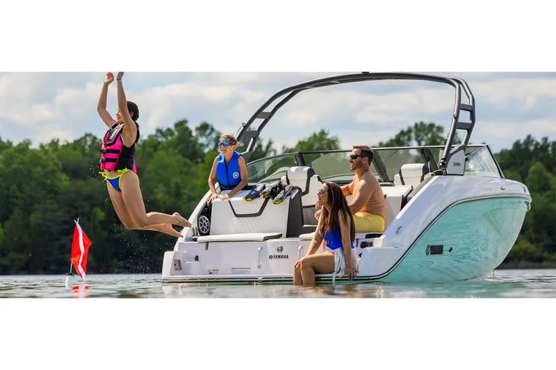 Slide: The Image of Family enjoying water fun on Yamaha 222S boat, 2026 model. - 9