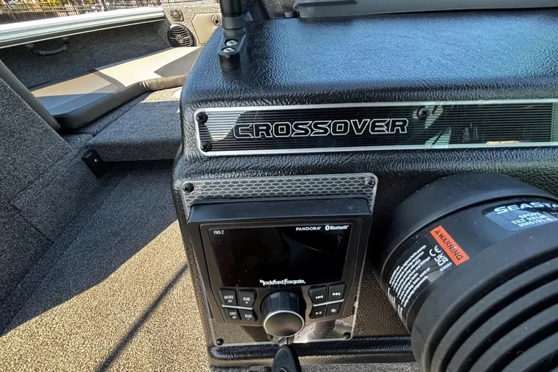 Slide: The Image of 2026 Lund 1875 Crossover XS dashboard with audio controls and branding. - 11