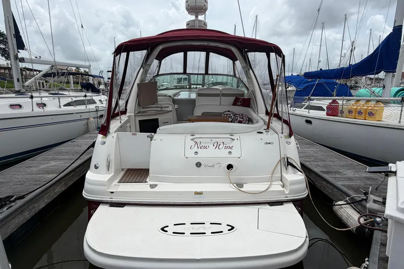 Slide: The Image of Sea Ray Sundancer 320 boat docked in marina, 2006 model. - 2