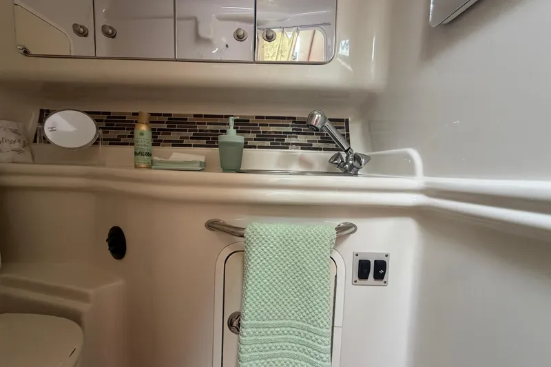 Slide: The Image of Bathroom interior of 2006 Sea Ray Sundancer 320 yacht with sink and towel. - 20