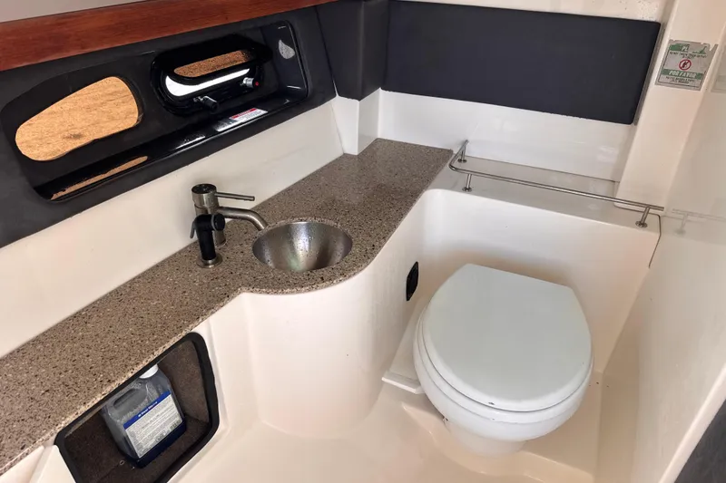 Slide: The Image of Luxurious bathroom in 2016 Sea Ray SLX 350 boat with sink and toilet. - 22