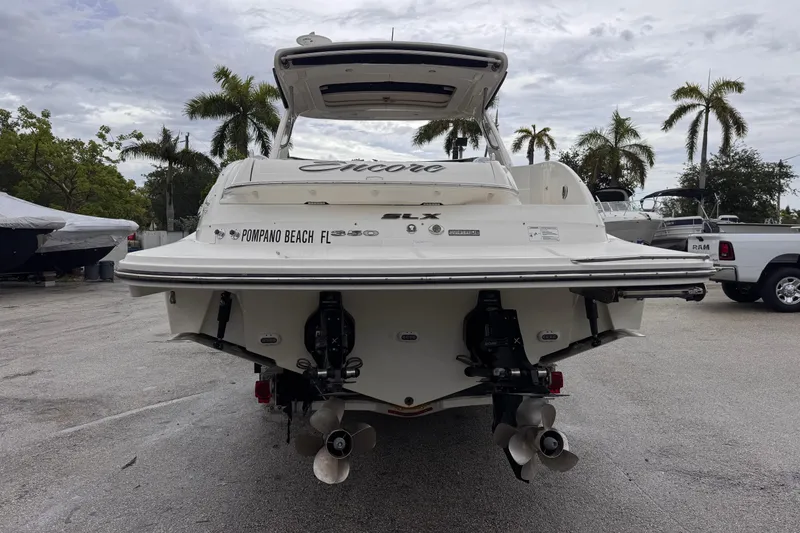 Slide: The Image of 2016 Sea Ray SLX 350 boat docked in Pompano Beach, Florida, rear view. - 5