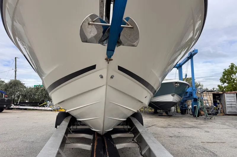 Slide: The Image of 2016 Sea Ray SLX 350 boat on trailer, viewed from the front. - 9
