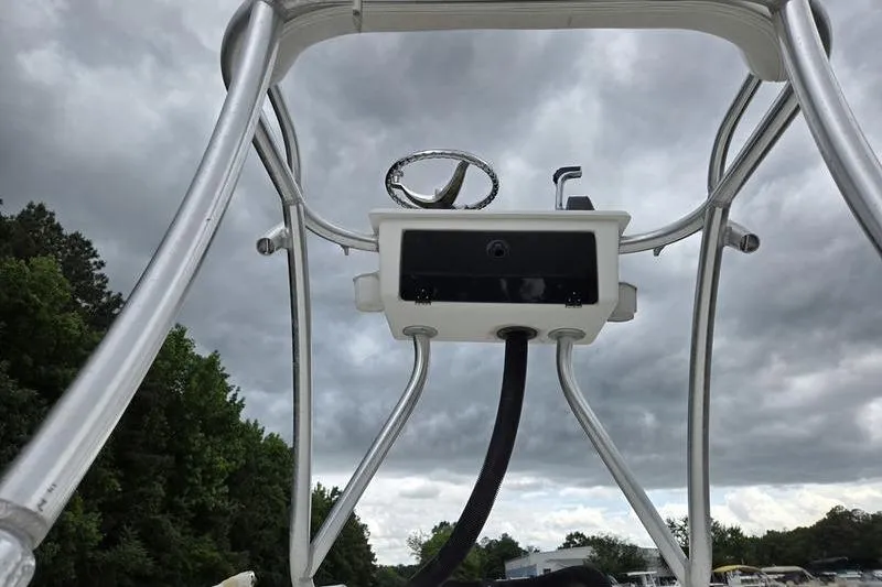 Slide: The Image of T-top view of 2011 Sea Hunt Triton 240 boat under cloudy sky. - 11