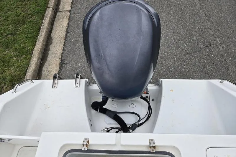 Slide: The Image of 2011 Sea Hunt Triton 240 boat engine view from above. - 6