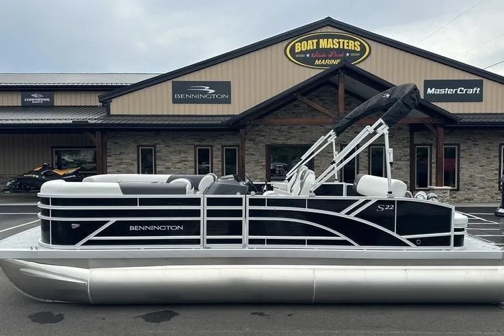 The Image of 2026 Bennington S Swingback 22 SSB pontoon boat at dealership, side view. - 1