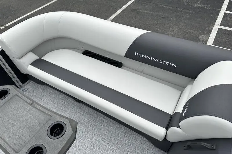Slide: The Image of 2026 Bennington S Swingback 22 SSB boat interior with sleek seating and cup holders. - 10