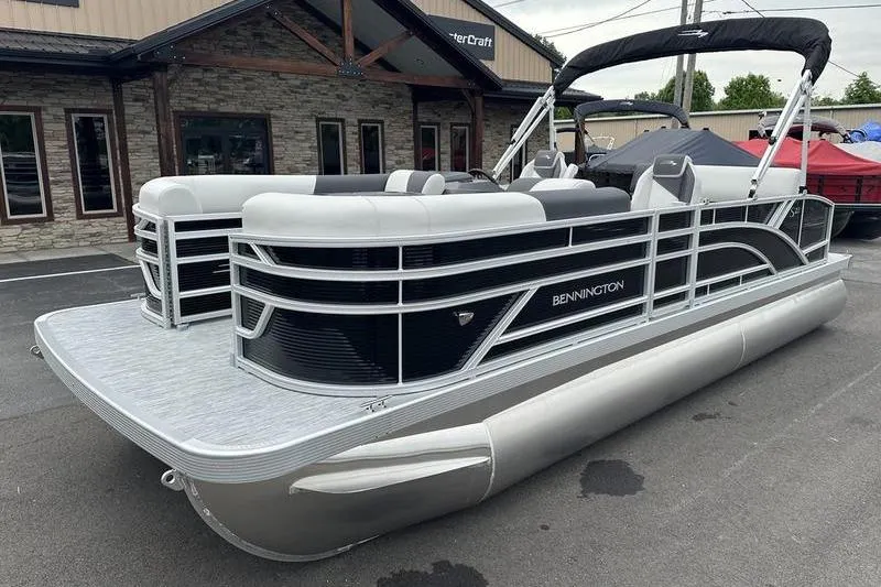 Slide: The Image of 2026 Bennington S Swingback 22 SSB pontoon boat with sleek design and modern features. - 3
