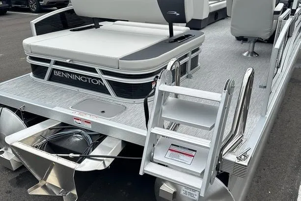 Slide: The Image of 2026 Bennington S Swingback 22 SSB pontoon boat with rear seating and ladder. - 5