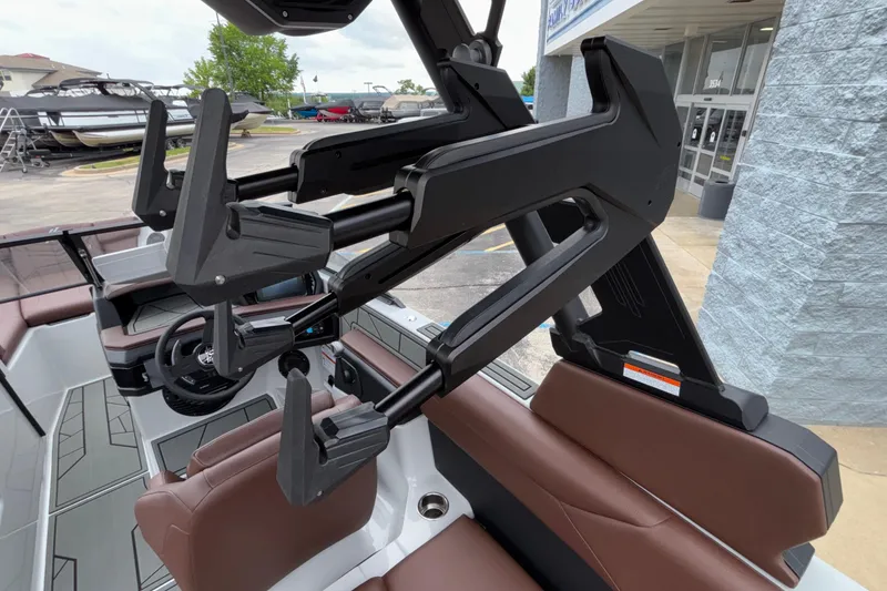 Slide: The Image of 2026 ATX Surf Boats 24 Type-S interior with advanced wakeboard rack system. - 13