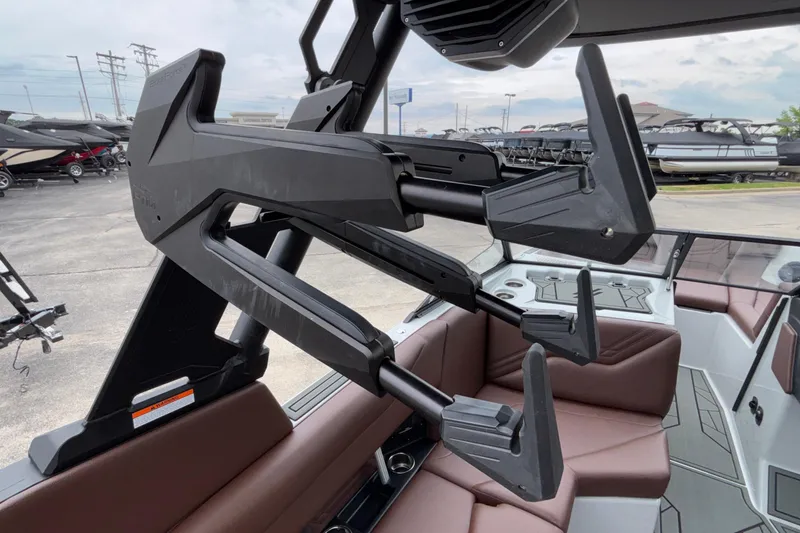 Slide: The Image of 2026 ATX Surf Boats 24 Type-S interior with advanced wakeboard rack and seating. - 14