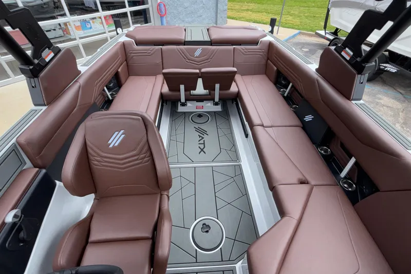 Slide: The Image of Luxurious interior of 2026 ATX Surf Boats 24 Type-S with brown seating and modern design. - 15