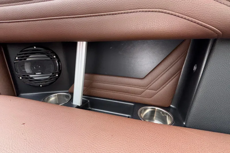 Slide: The Image of Interior of 2026 ATX Surf Boats 24 Type-S with speaker and cup holders. - 28