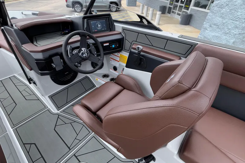 Slide: The Image of Interior of 2026 ATX Surf Boats 24 Type-S with modern dashboard and brown seating. - 36
