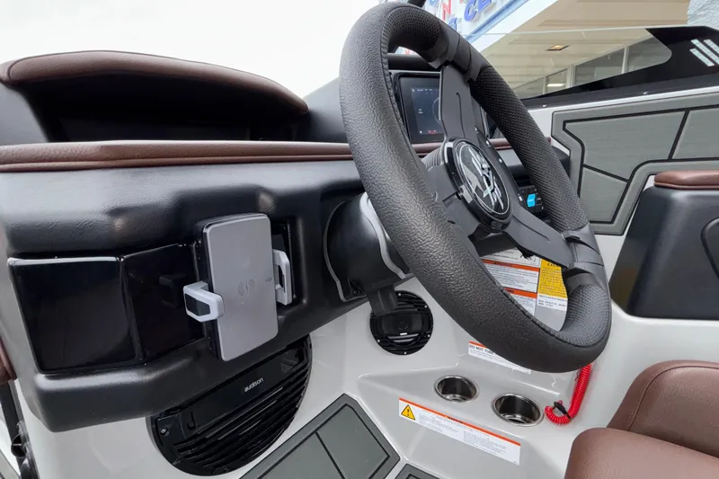 Slide: The Image of Steering wheel and dashboard of 2026 ATX Surf Boats 24 Type-S. - 38