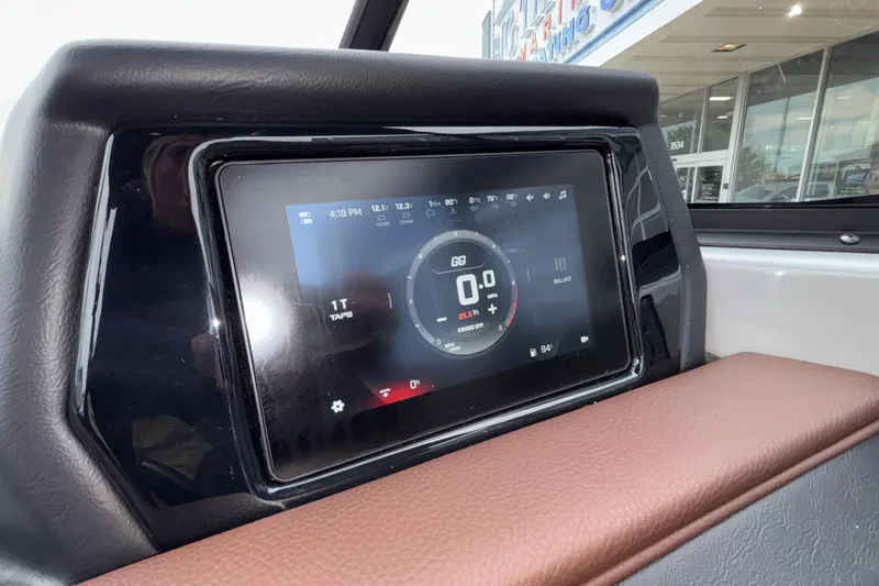 Slide: The Image of Dashboard display of 2026 ATX Surf Boats 24 Type-S, showing speed and settings. - 41