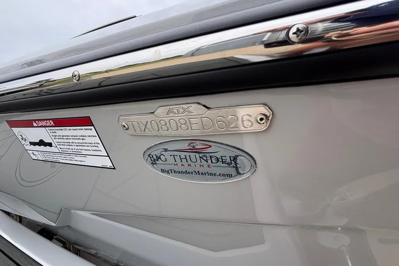Slide: The Image of 2026 ATX Surf Boats 24 Type-S hull identification and warning label close-up. - 5