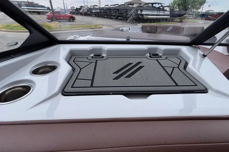 Slide: The Image of 2026 ATX Surf Boats 24 Type-S dashboard with cup holders and sleek design. - 50