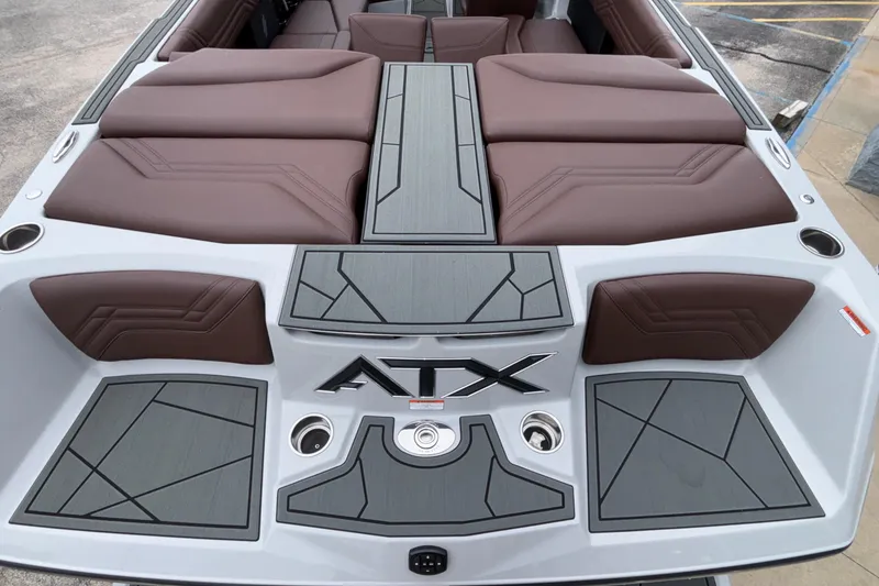 Slide: The Image of 2026 ATX Surf Boats 24 Type-S with brown seating and modern deck design. - 9