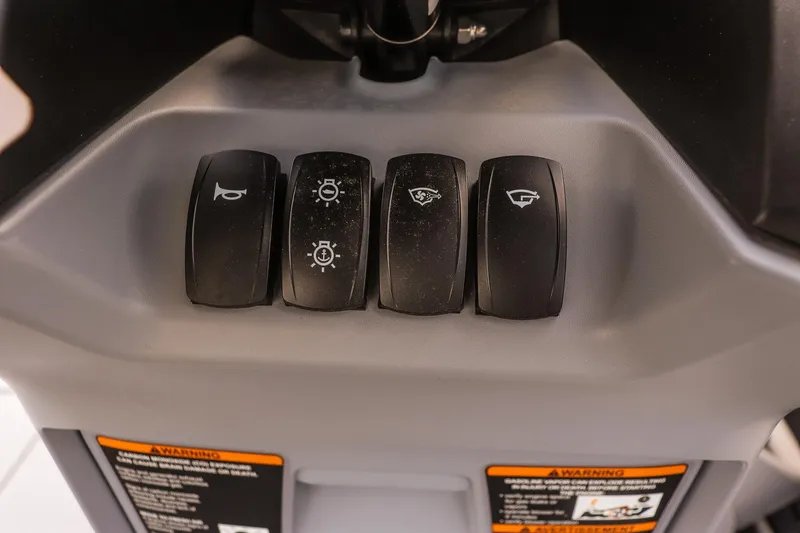 Slide: The Image of Control panel of 2026 Sea-Doo Switch Cruise 21 with labeled switches. - 16