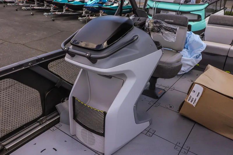 Slide: The Image of 2026 Sea-Doo Switch Cruise 21 interior with steering console and seating. - 19